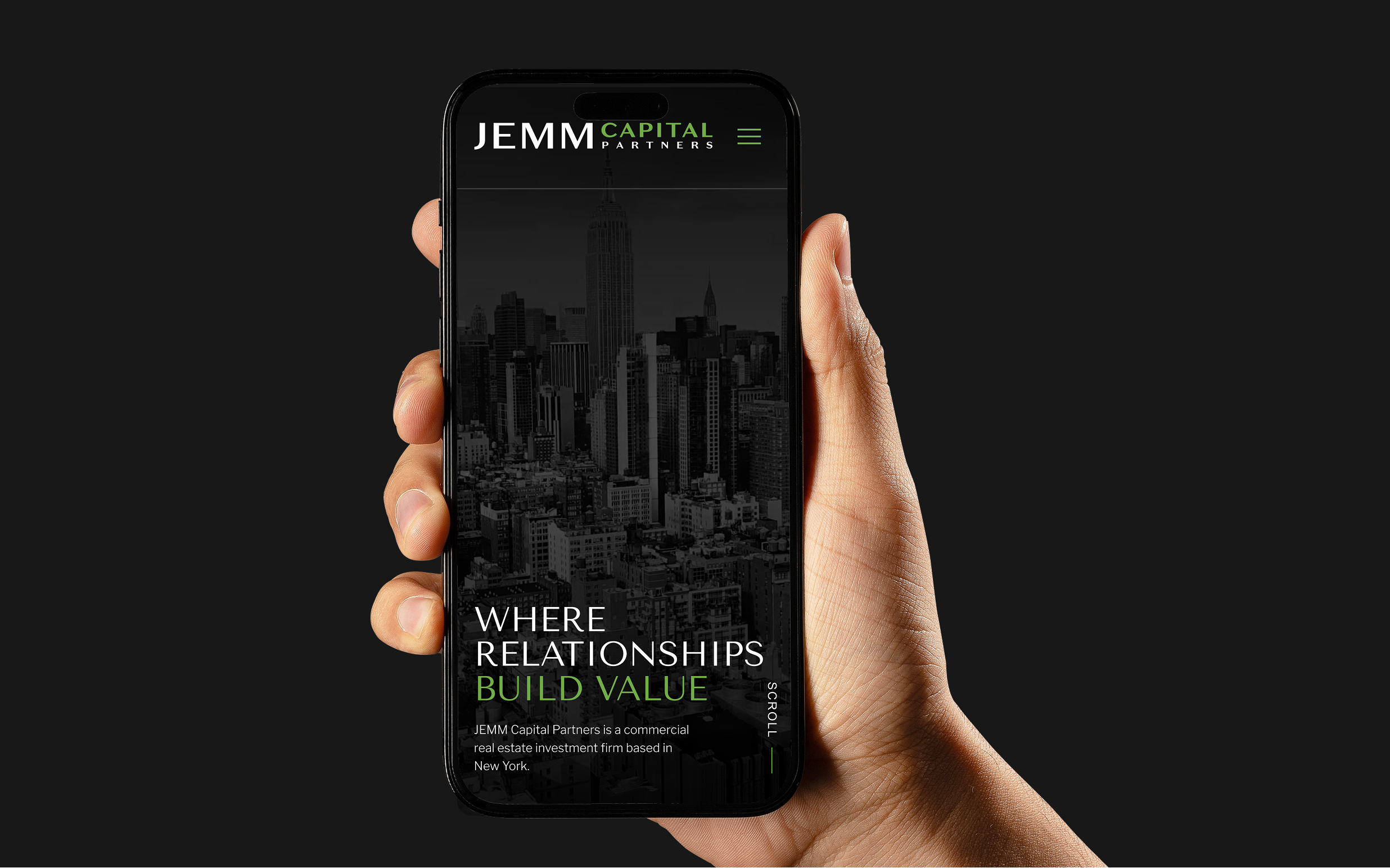 Hand holding mobile phone with JEMM Capital Partners website design